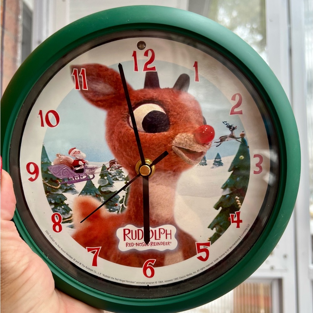 Rudolph the Red-Nosed Reindeer" musical wall clock.